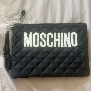 Hardly ever used Moschino Logo Quilted Nylon Wristlet
Perfect condition!